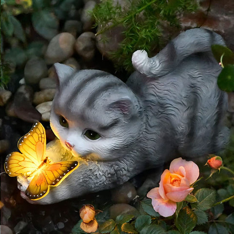 hYwecy solar garden statue cat holding butterfly lights the garden at night
