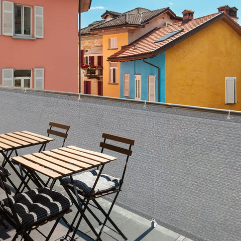 i COVER grey balcony privacy screen enhances outdoor space with subtle privacy.