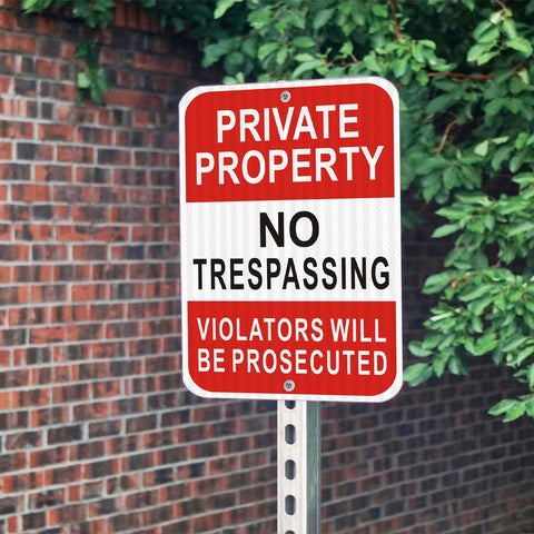 i-CowFun reflective-surface sign increases nighttime visibility on outdoor property boundaries