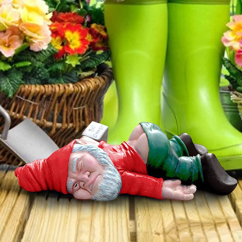 IcyAits garden-gnome-small-statue complements flower beds and fences with whimsy.