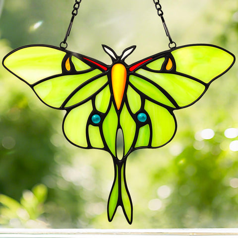 IDEA SHOW Luna Moth suncatcher glows in sunlight, brightening windows with vibrant stained glass color.