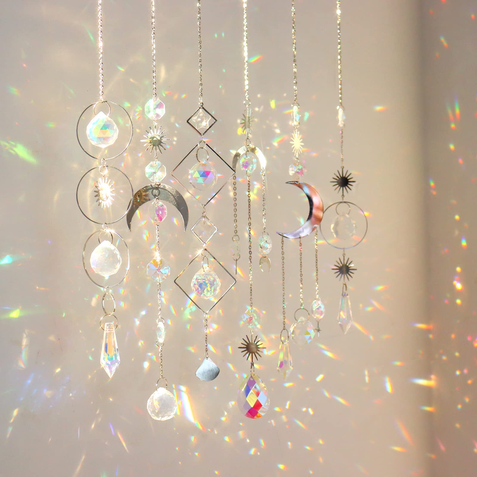 ilclviz crystal suncatchers 6pc set catching sunlight to create colorful rainbows indoors.