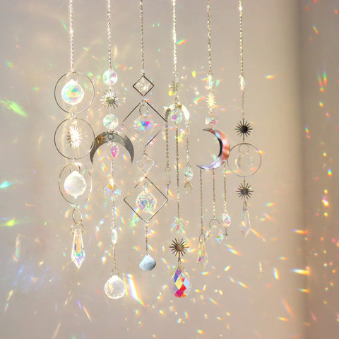 ilclviz crystal suncatchers 6pc set catching sunlight to create colorful rainbows indoors.