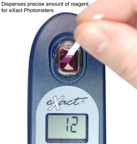 Industrial Test Systems DPD-1 strip being dipped into a photometer cell for quick readings.