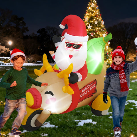 InfleasJoiy outdoor Christmas inflatable yard decoration glows at night on the lawn.