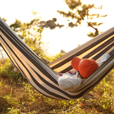 INNO STAGE two-person hammock stretched across a backyard for shared comfort