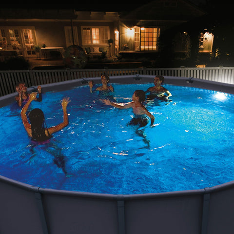 Intex pool light close-up shows magnetic attachment and bright glow.