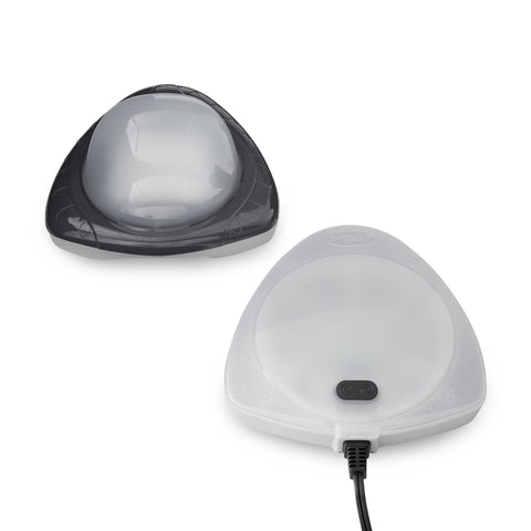 Intex underwater LED magnetic pool light attached to wall for secure illumination.