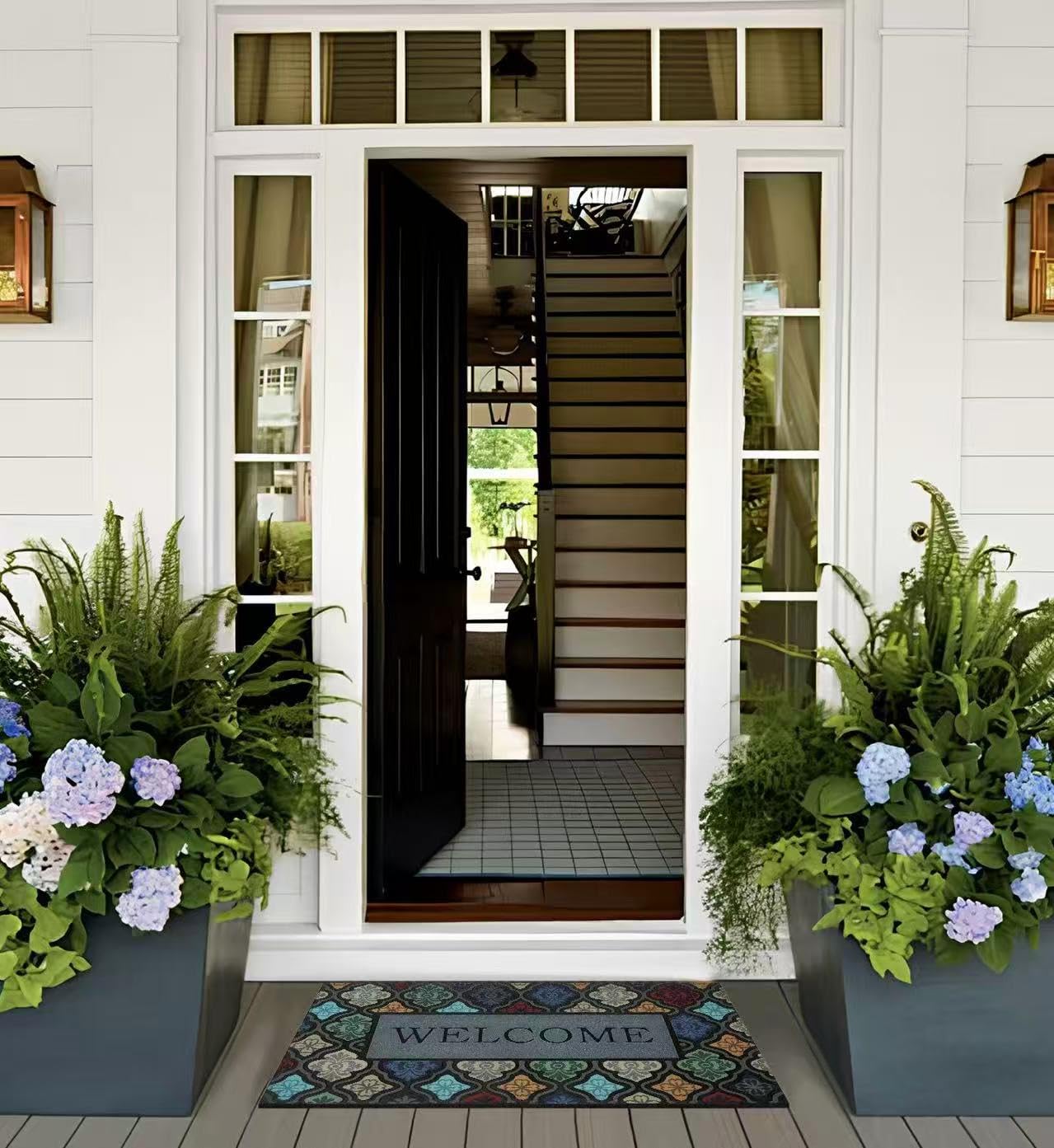 Iouwy colorful flower welcome mat textured-grooves enhances dirt scraping at the doorway.