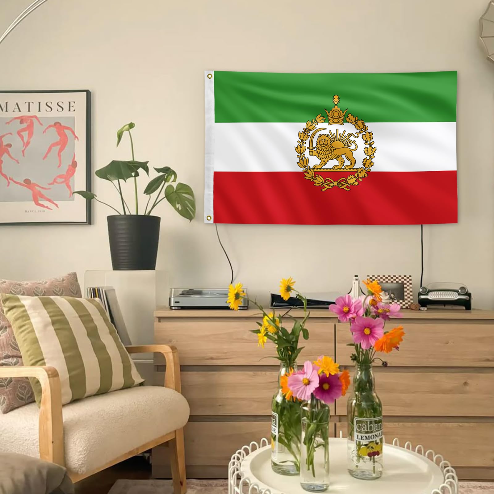Iran flag displayed in yard or garden for outdoor pride