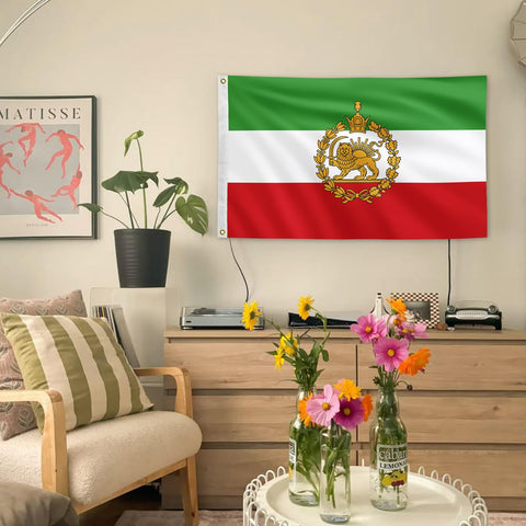 Iran flag displayed in yard or garden for outdoor pride