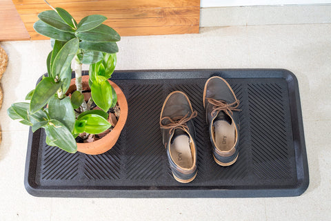 IRONGATE indoor-outdoor boot tray keeps mud and dirt contained.