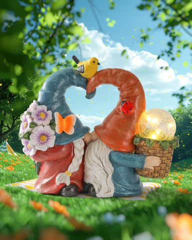 istatue solar kissing gnomes outdoors with sun-powered glow for evenings