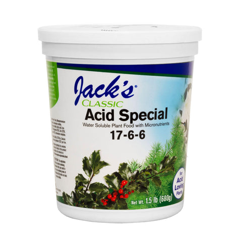 Jack's Classic Acid Special powder being mixed with water for root feeding.