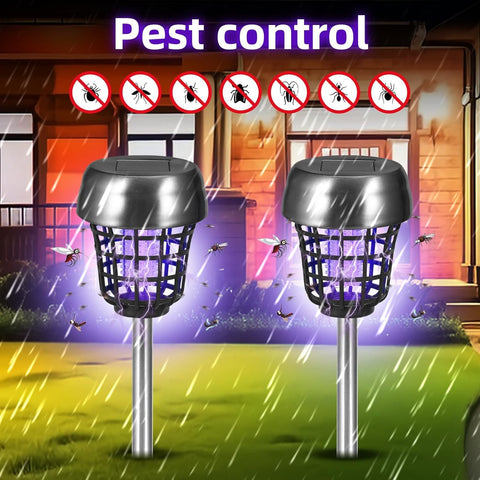 JahyElec solar bug zapper white LED lighting illuminating an outdoor path.