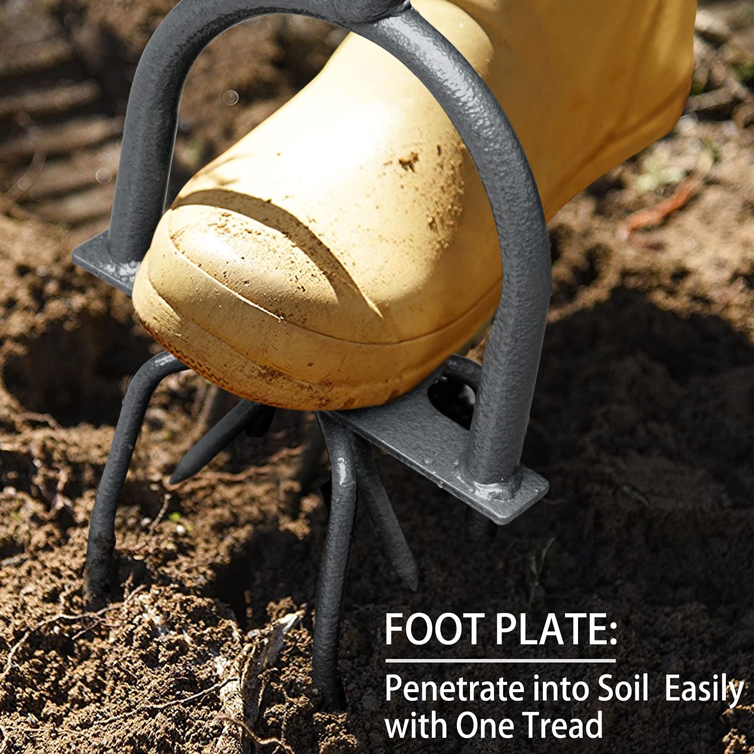 Jardineer Hand Tiller used in raised beds to loosen compacted soil and amendments.