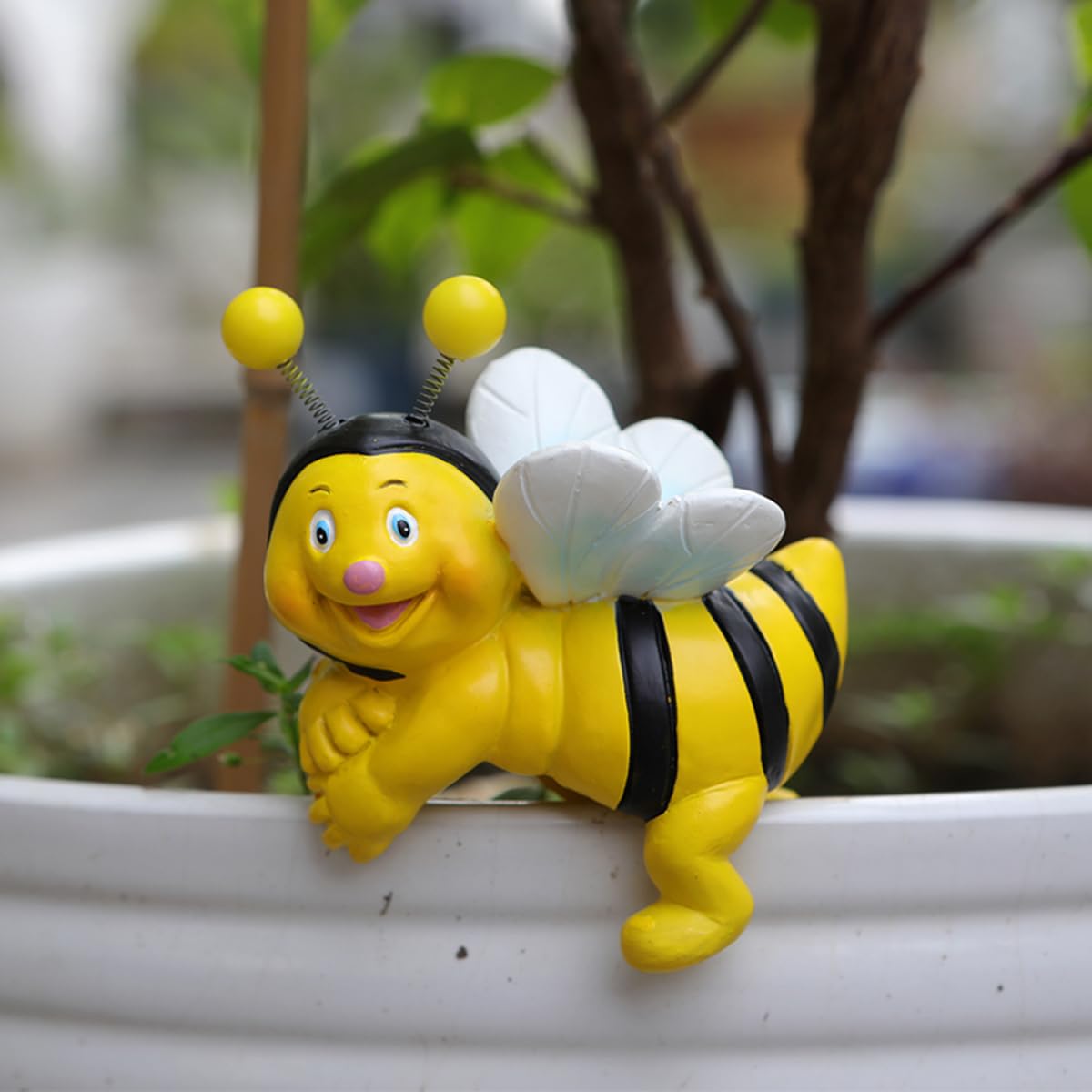 Jarpsiry bee hugger perched on rim ideal for planters.