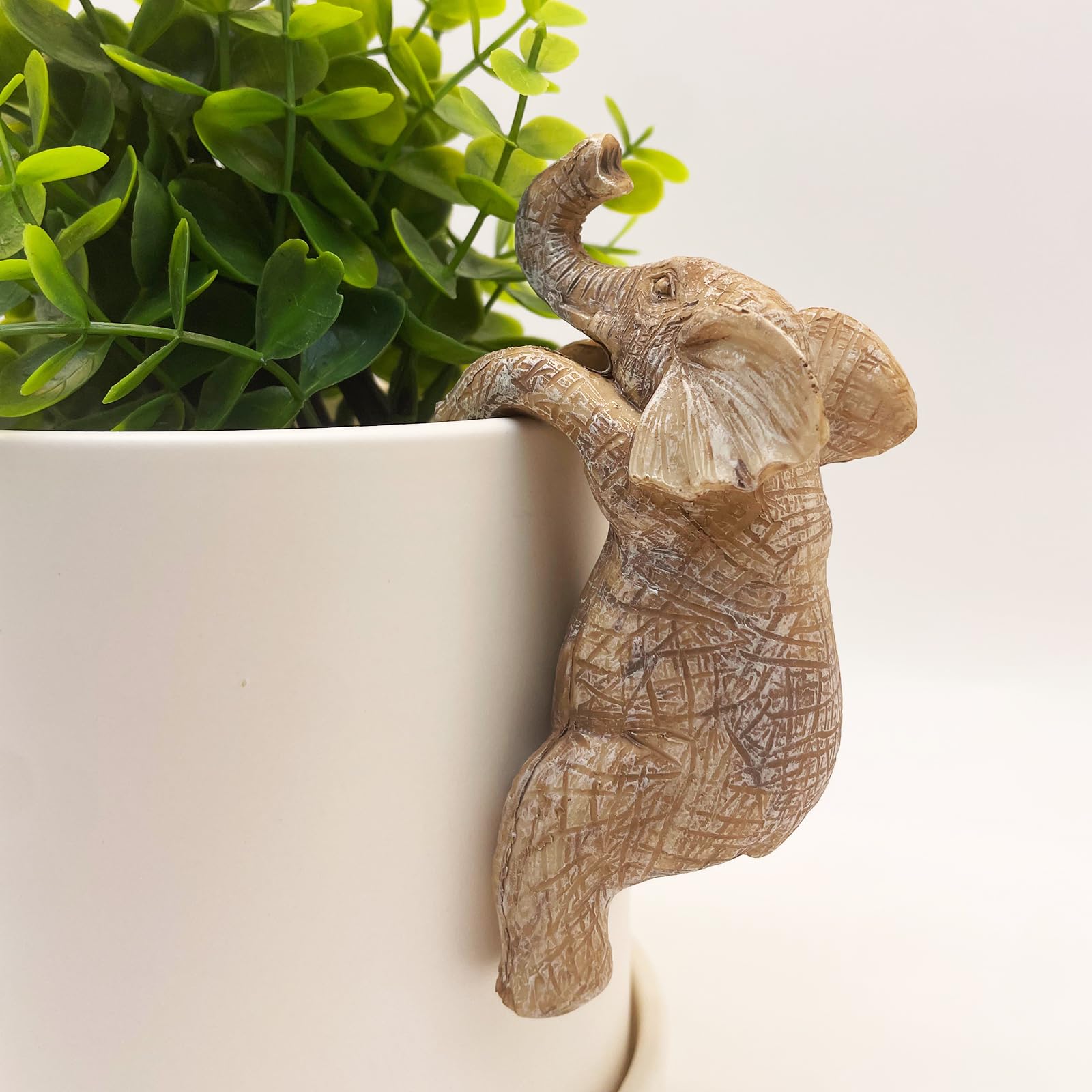 JARPSIRY elephant hugger on balcony decor adds whimsy.