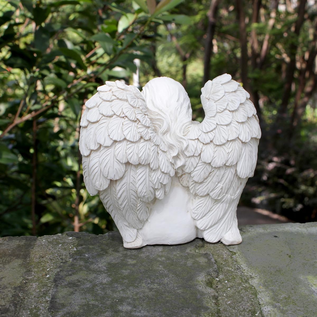 JARPSIRY garden ornament with bird elevates plantings and paths.