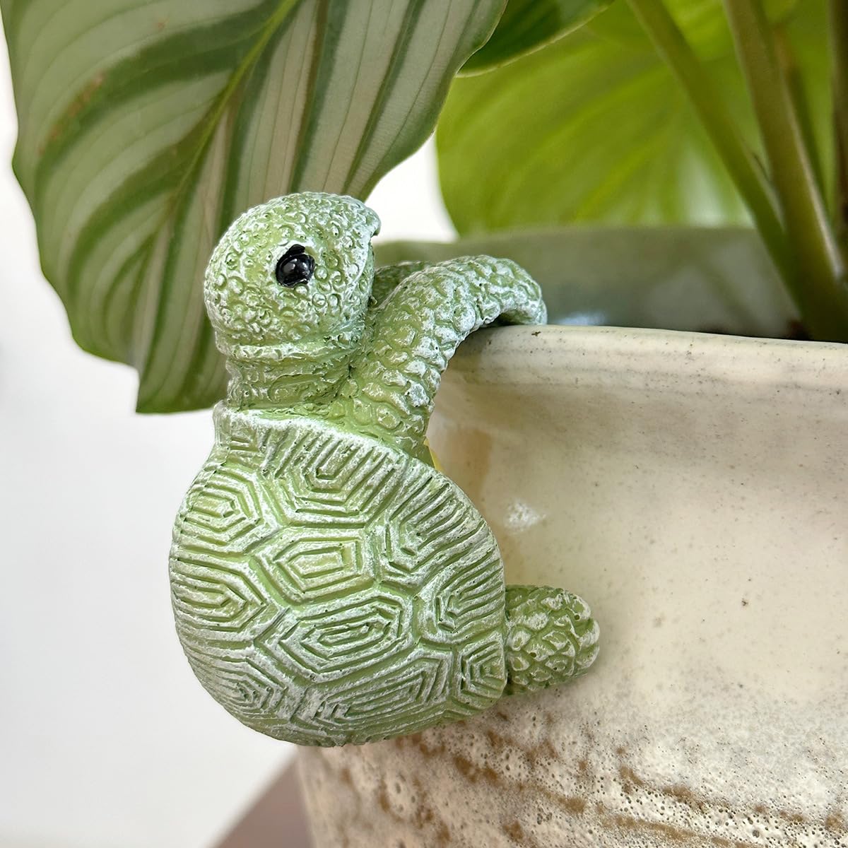 JARPSIRY resin turtle statue planter near a patio rail for eye-catching decor.