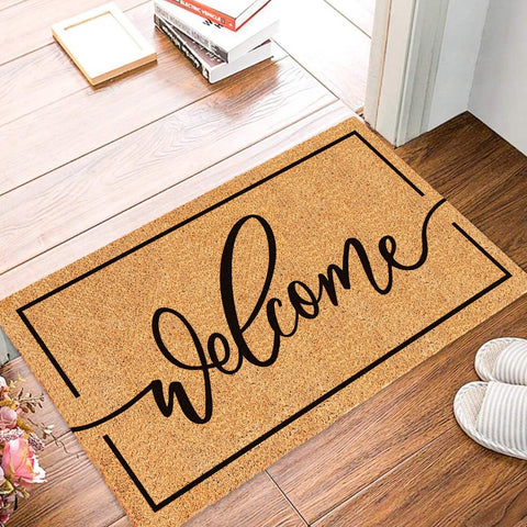 JarThenaAMCS Natural coir entrance mat helps sweep debris from shoes.
