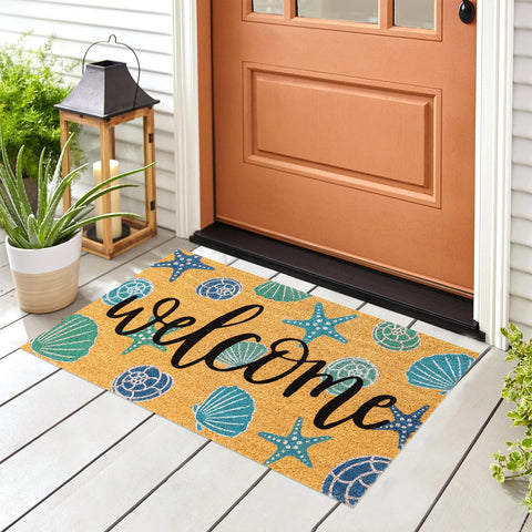 JarThenaAMCS starfish seashell door mat adds coastal charm to the entry