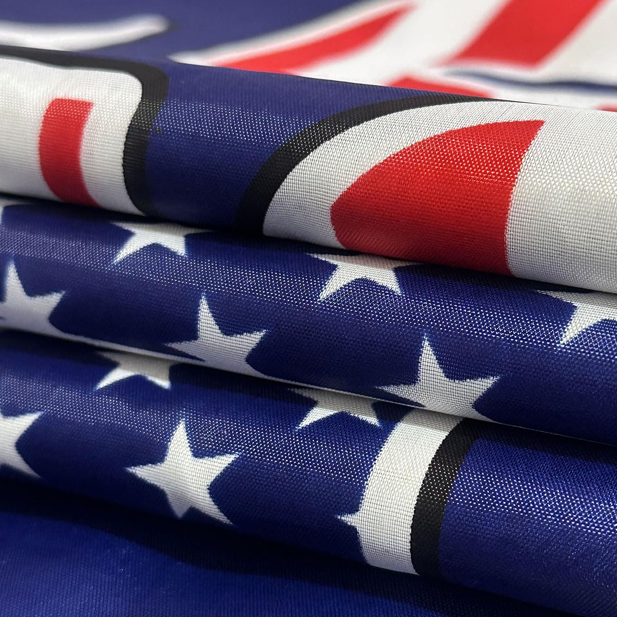 Jayus 3-ply double-sided flag detail highlighting sturdy stitching.