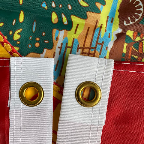 Jayus flag with brass grommets for easy mounting and secure hanging.