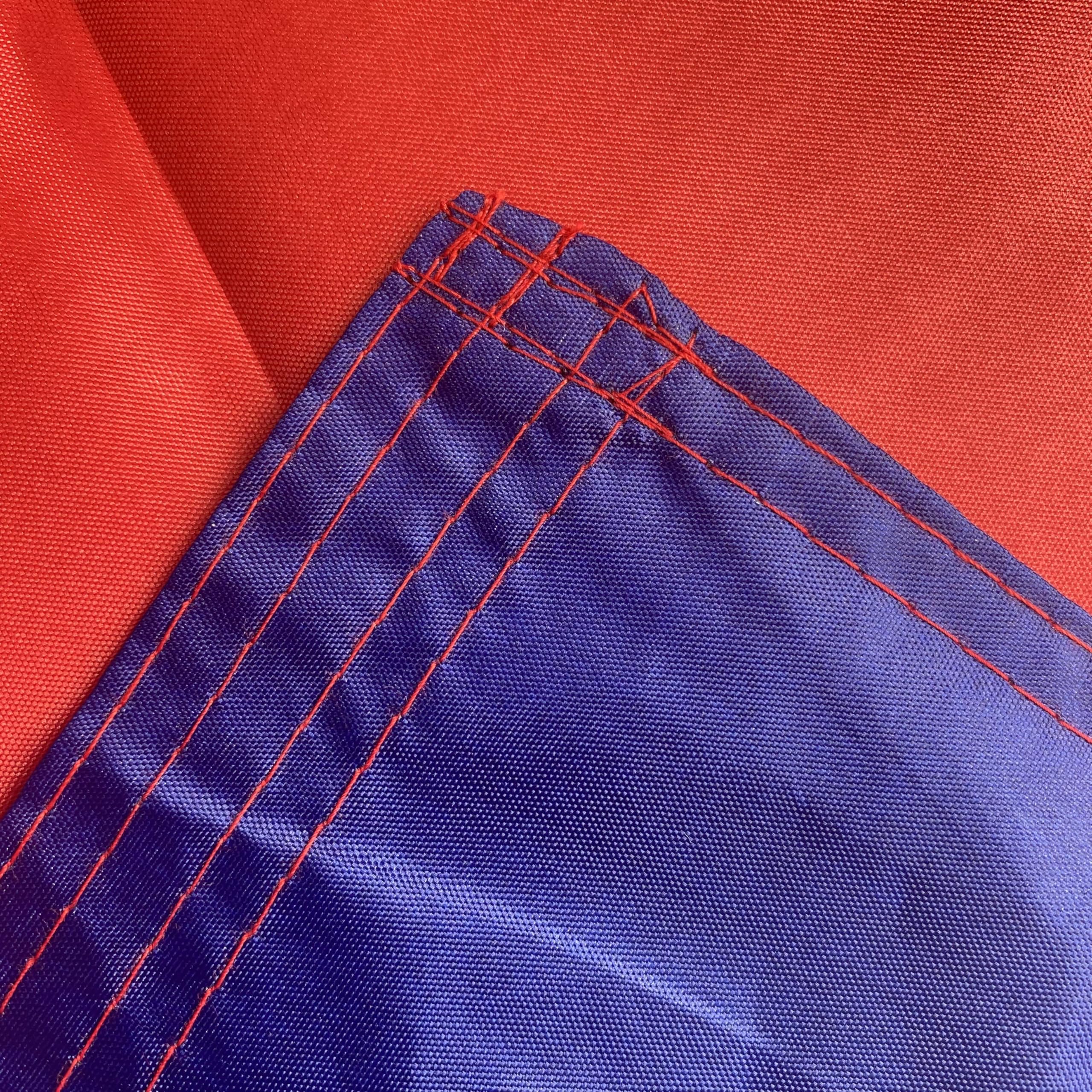 Jayus flag on a pole demonstrates sturdy double-sided printing for versatile display