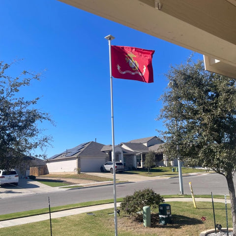 Jayus USMC flag with two brass grommets for secure mounting.