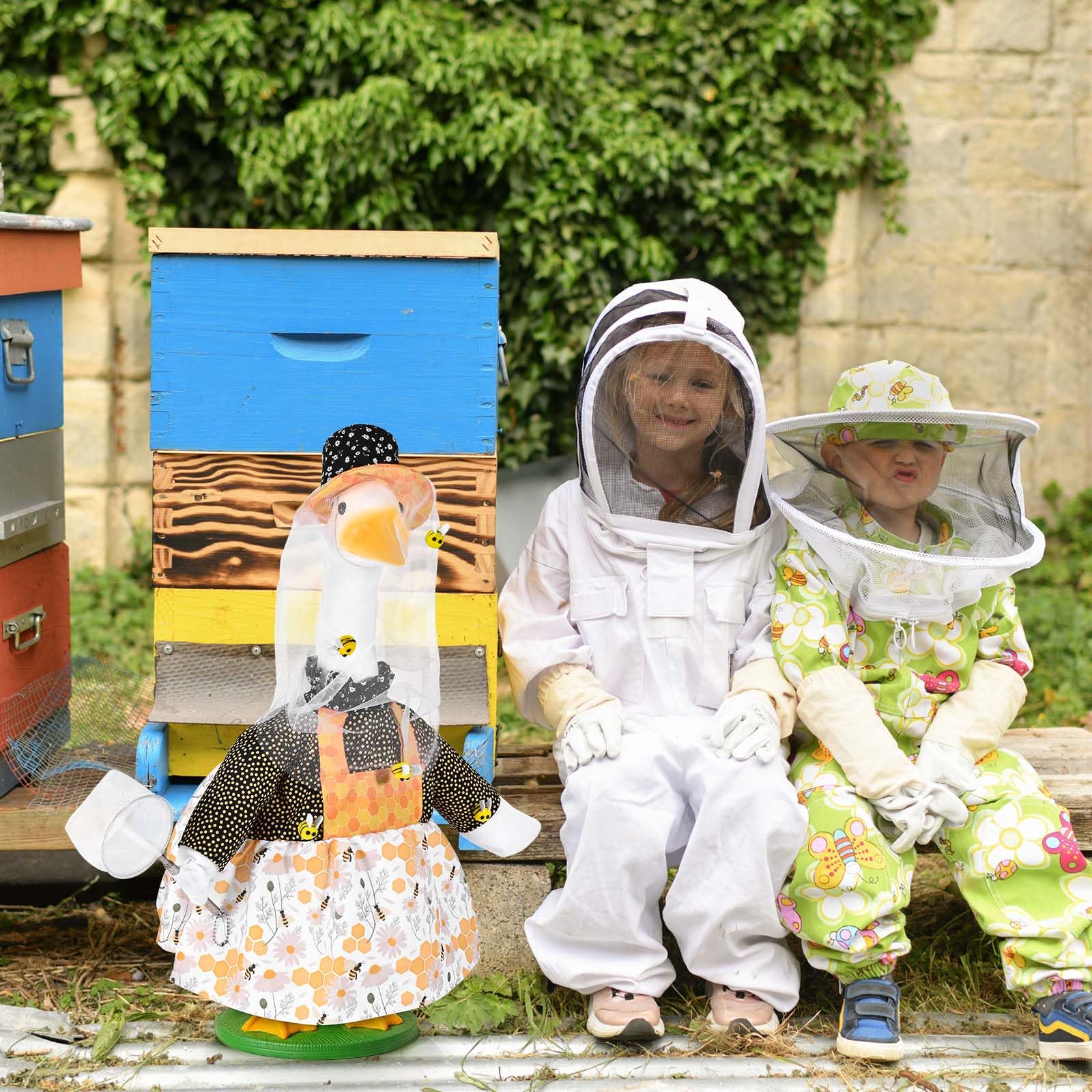 JcHrmers festive garden costume elevates yard decor during parties.