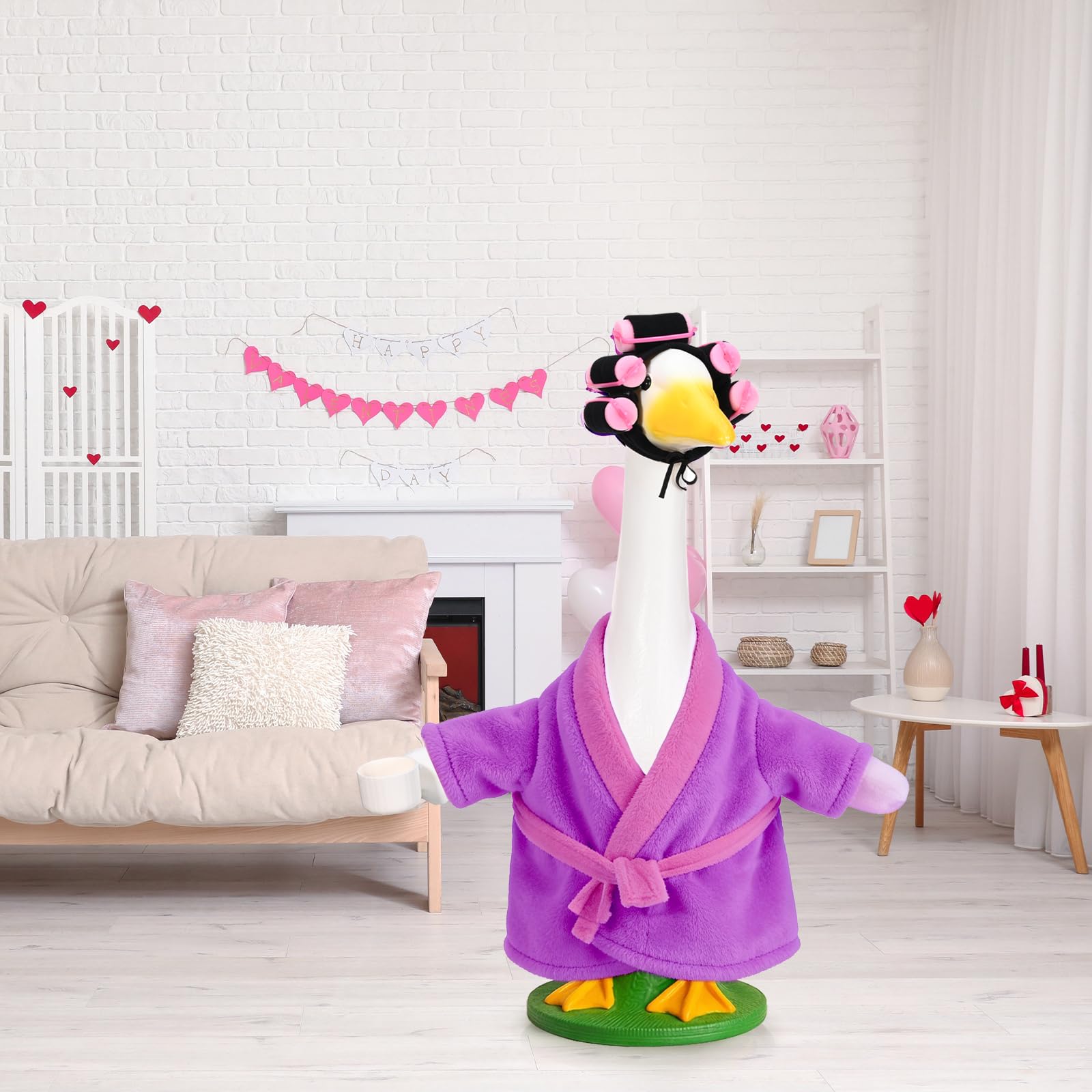 JcHrmers goose statue dress-up accessory makes cement or plastic statues look stylish.