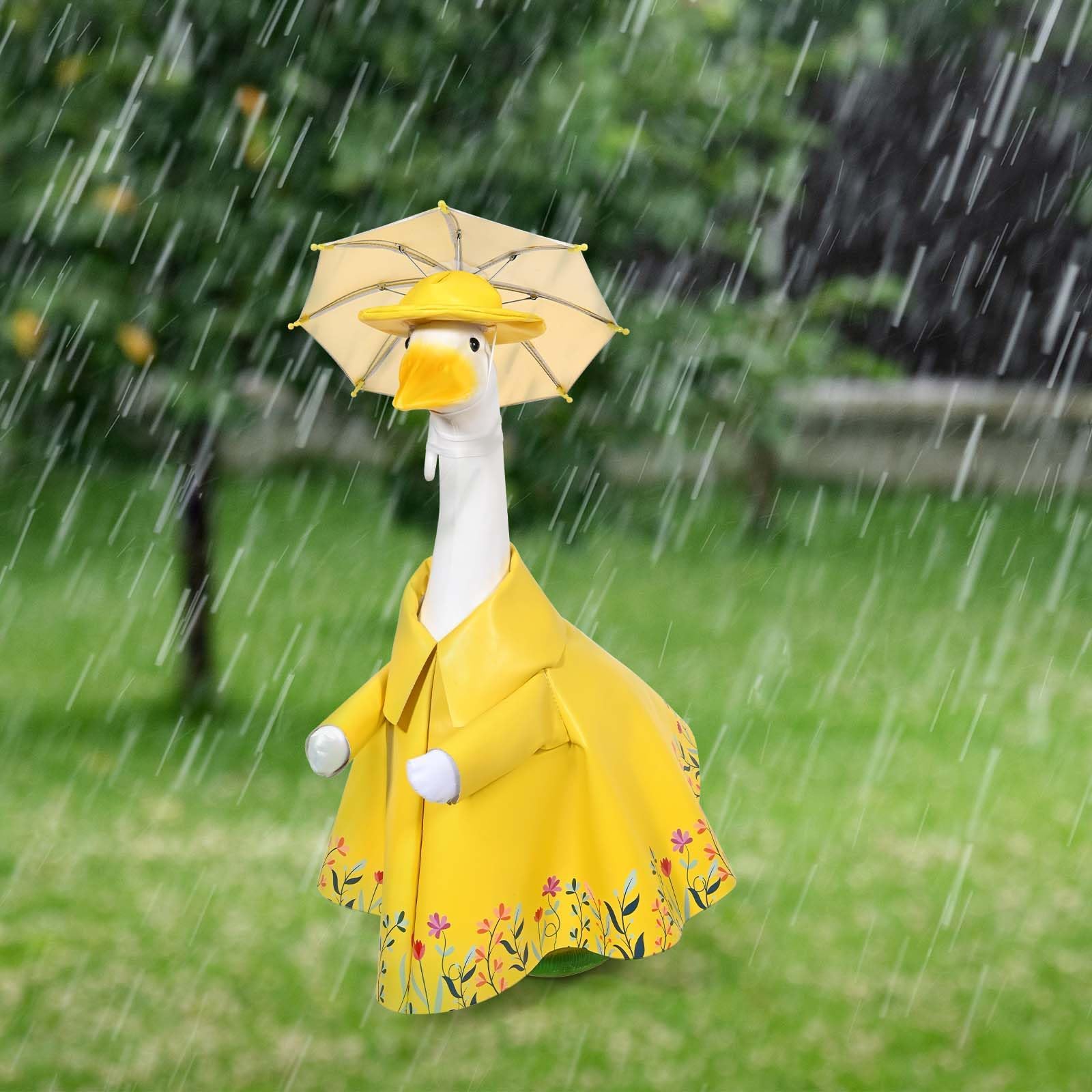 JcHrmers Outdoor goose decor ensemble is easy to update seasonally.