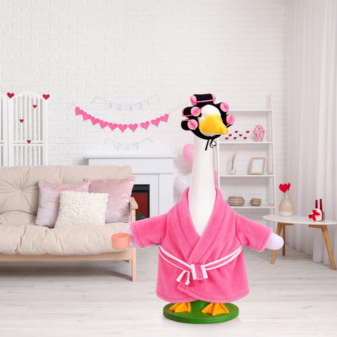 JcHrmers pink bathrobe goose outfit adds playful holiday charm.