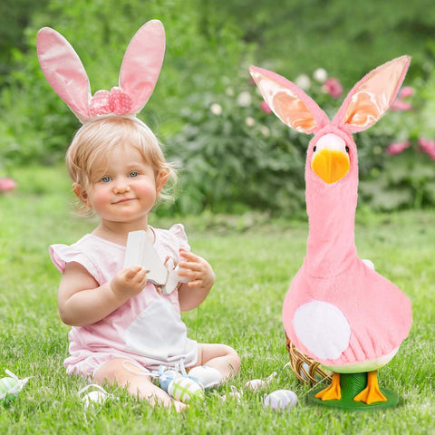 JcHrmers bunny ears on goose enhances Easter lawn displays.