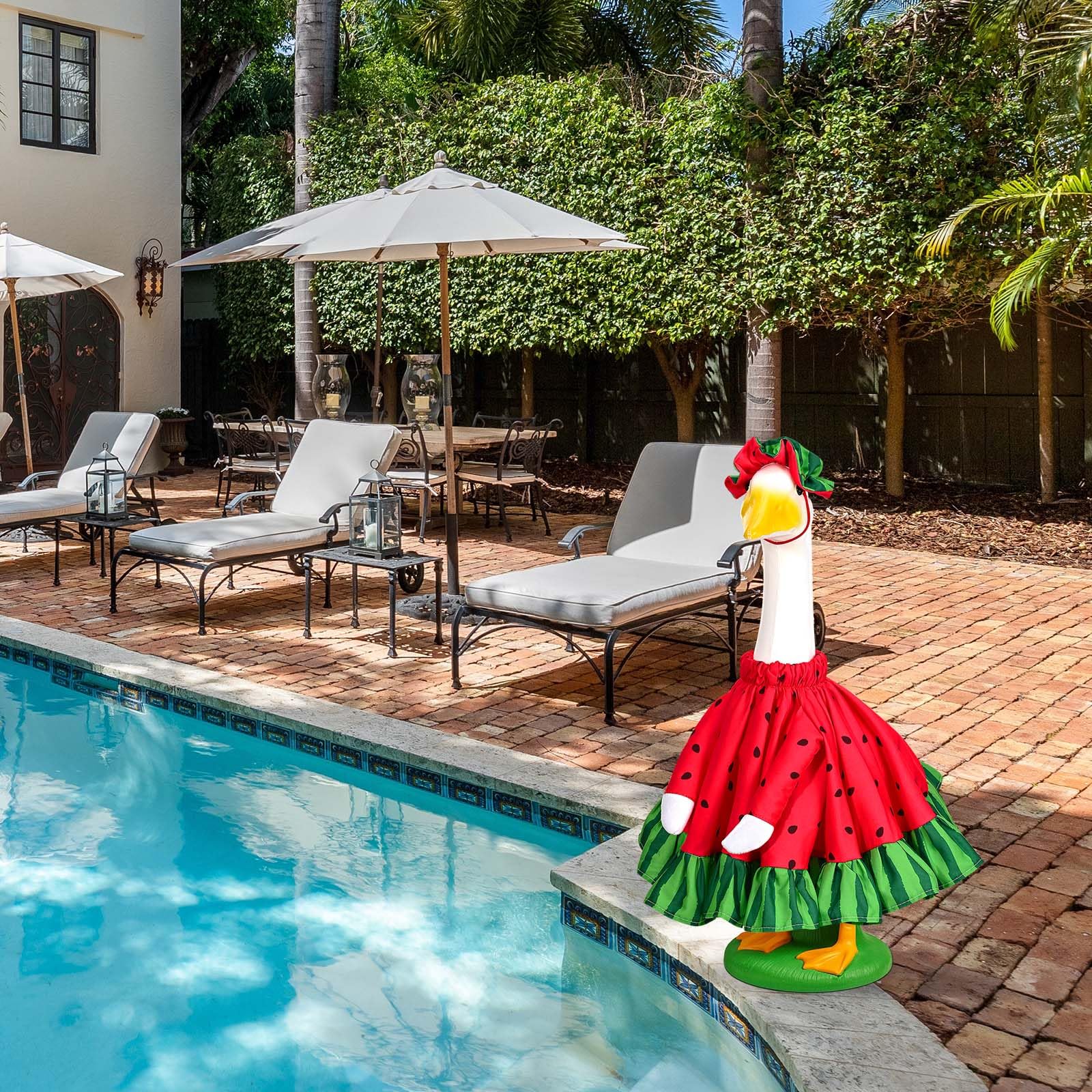 Goose statue dressed in watermelon outfit on outdoor display
