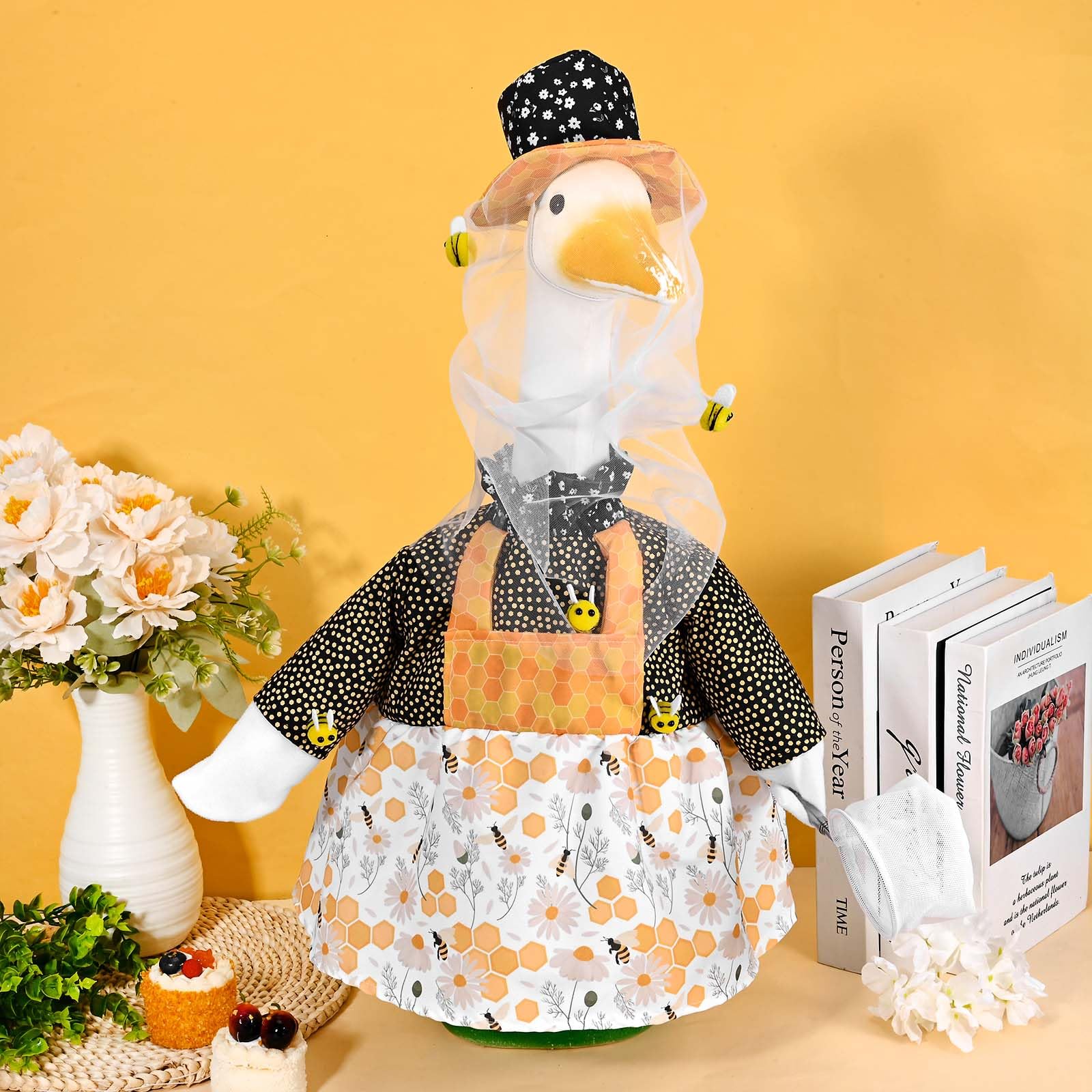 JcHrmers weather-resistant polyester keeps goose outfit vibrant outdoors.