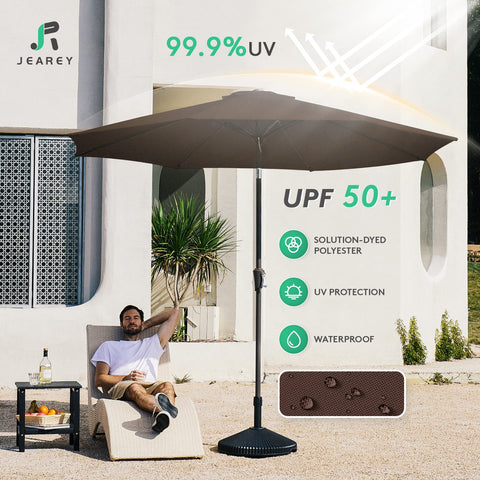 JEAREY 9ft market-style umbrella provides broad shade for patio dining.