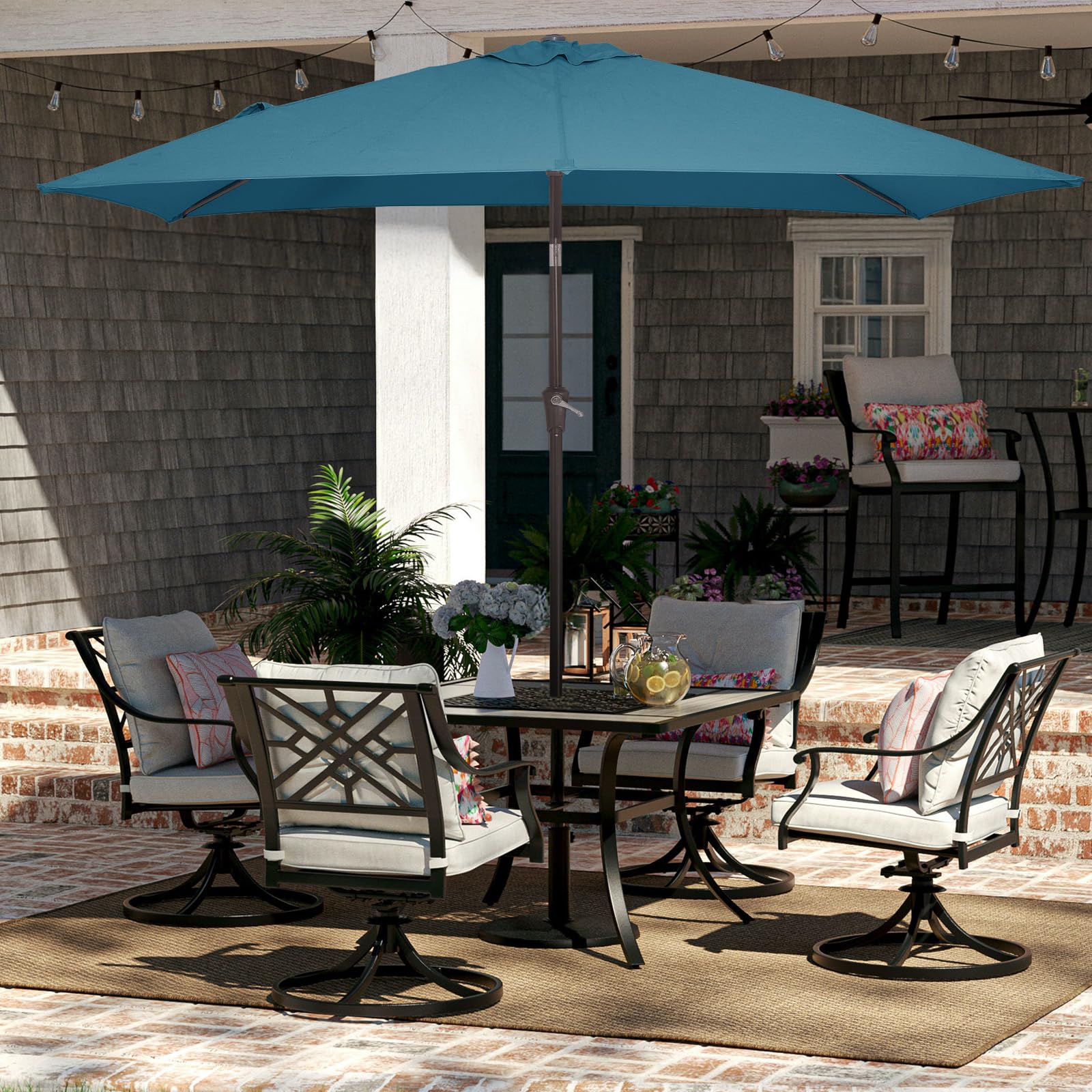 JEAREY rectangle patio umbrella tilt button demonstrating adjustable angle for sun direction.