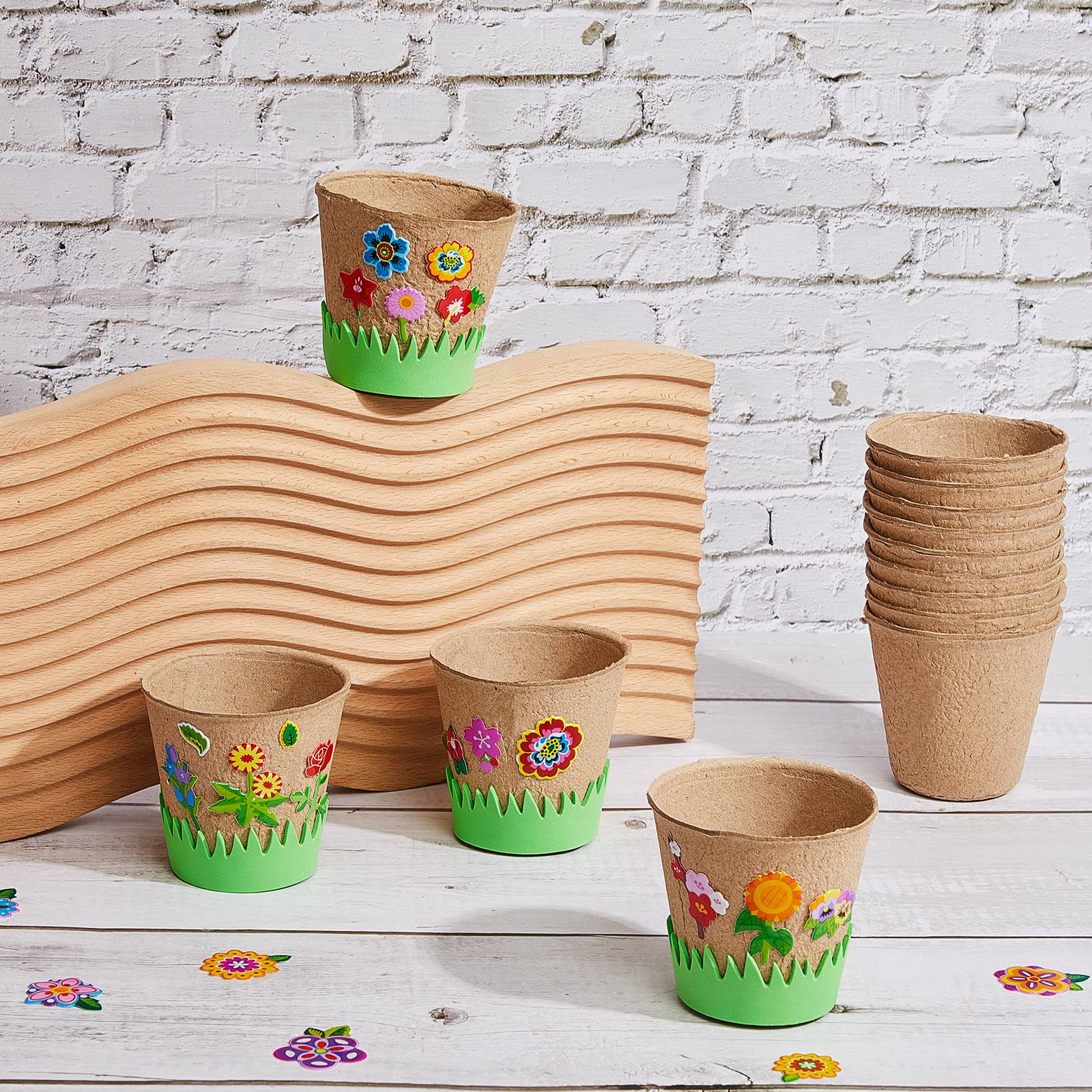 Jecery DIY flower pot design session showing kids decorating their pots