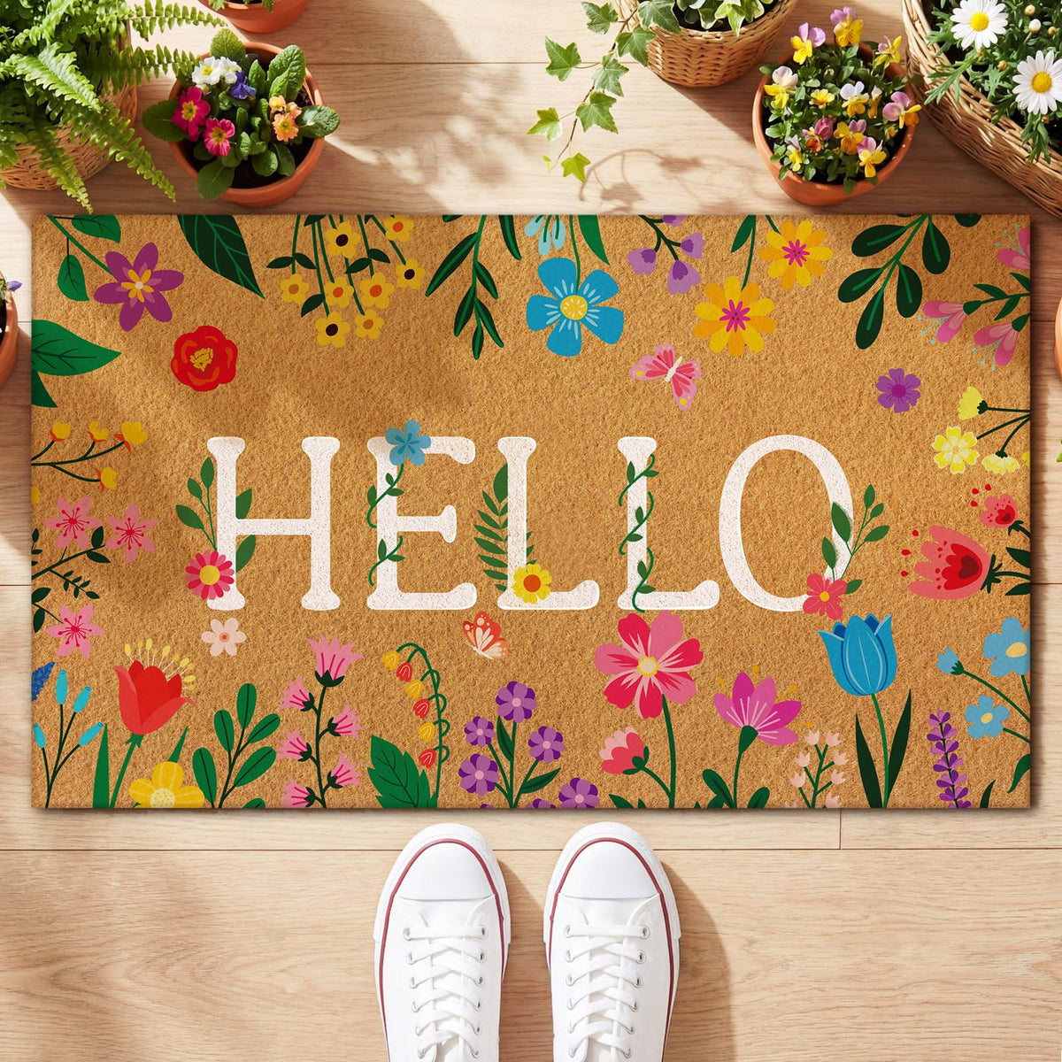 Jenaai Spring Coir Doormat with floral hello, ideal for outdoor entrances.