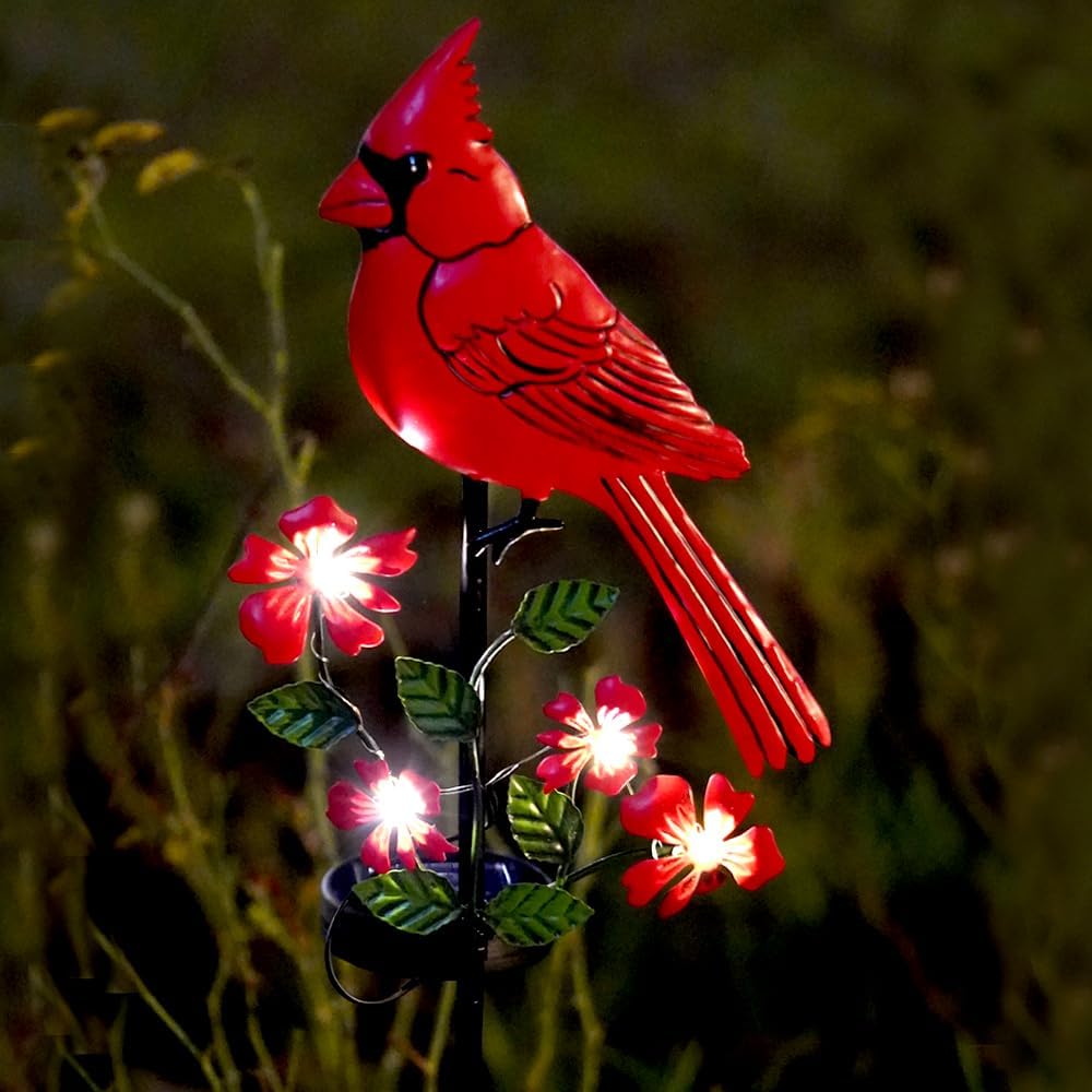 Jiasku cardinal ornament for outdoor decor glows softly after dusk.
