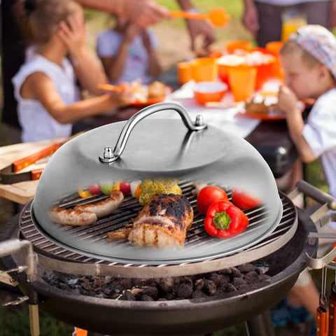 Cool-touch stainless handle on the Jirktiy griddle dome for safe handling.