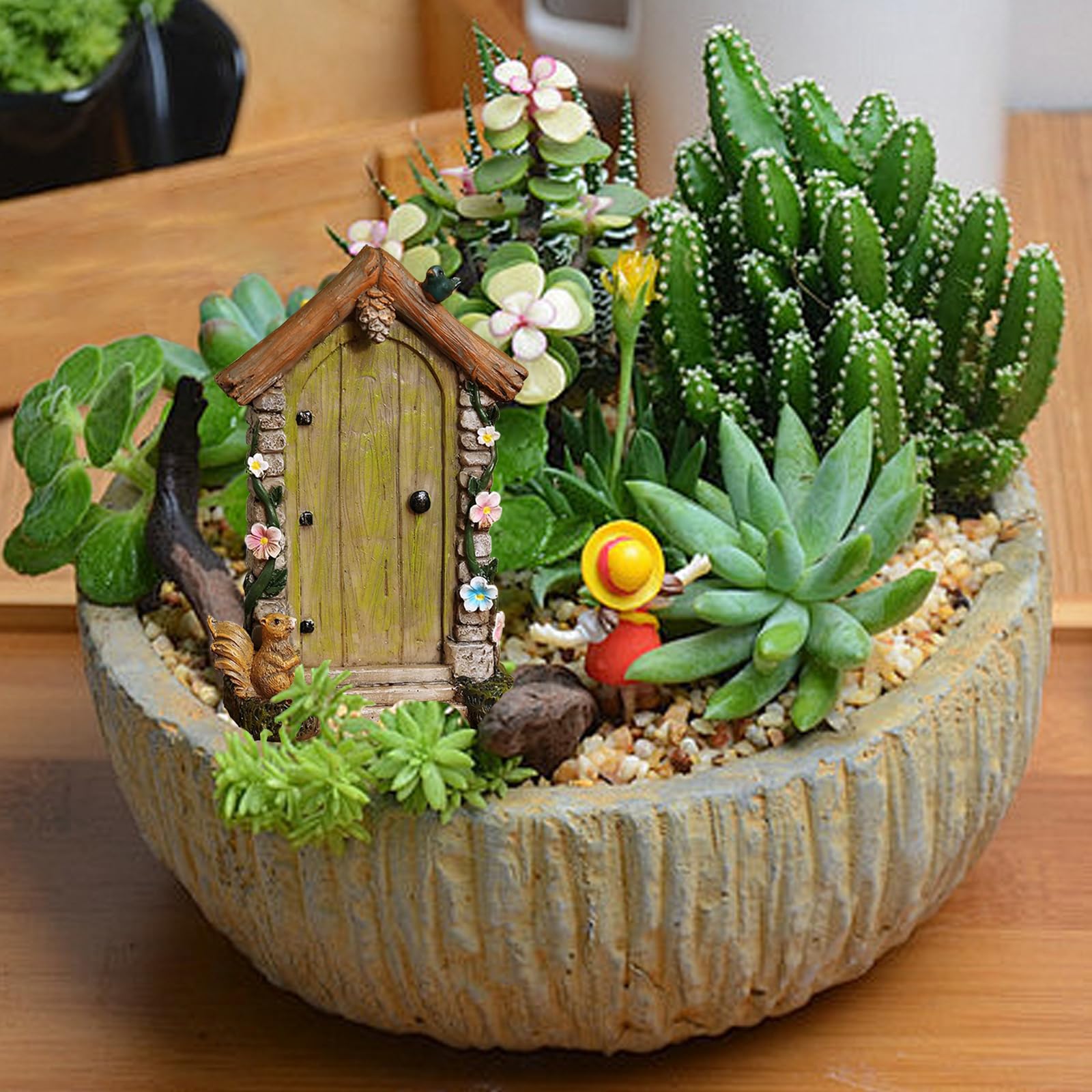 Jiumo weatherproof resin fairy door provides durable garden charm year-round.