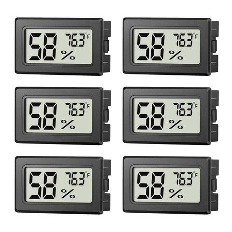 JJMTDS mini hygrometer display showing clear readings for quick room checks