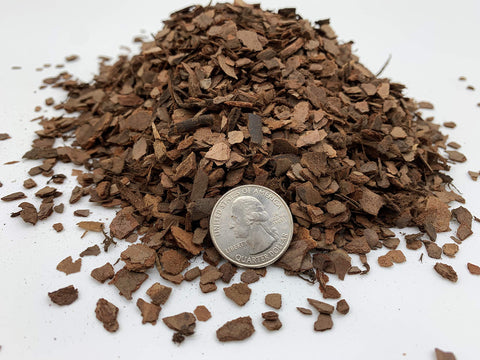 JK Global Imports Pine Bark Nugget Fines supporting orchid upright growth and moisture balance