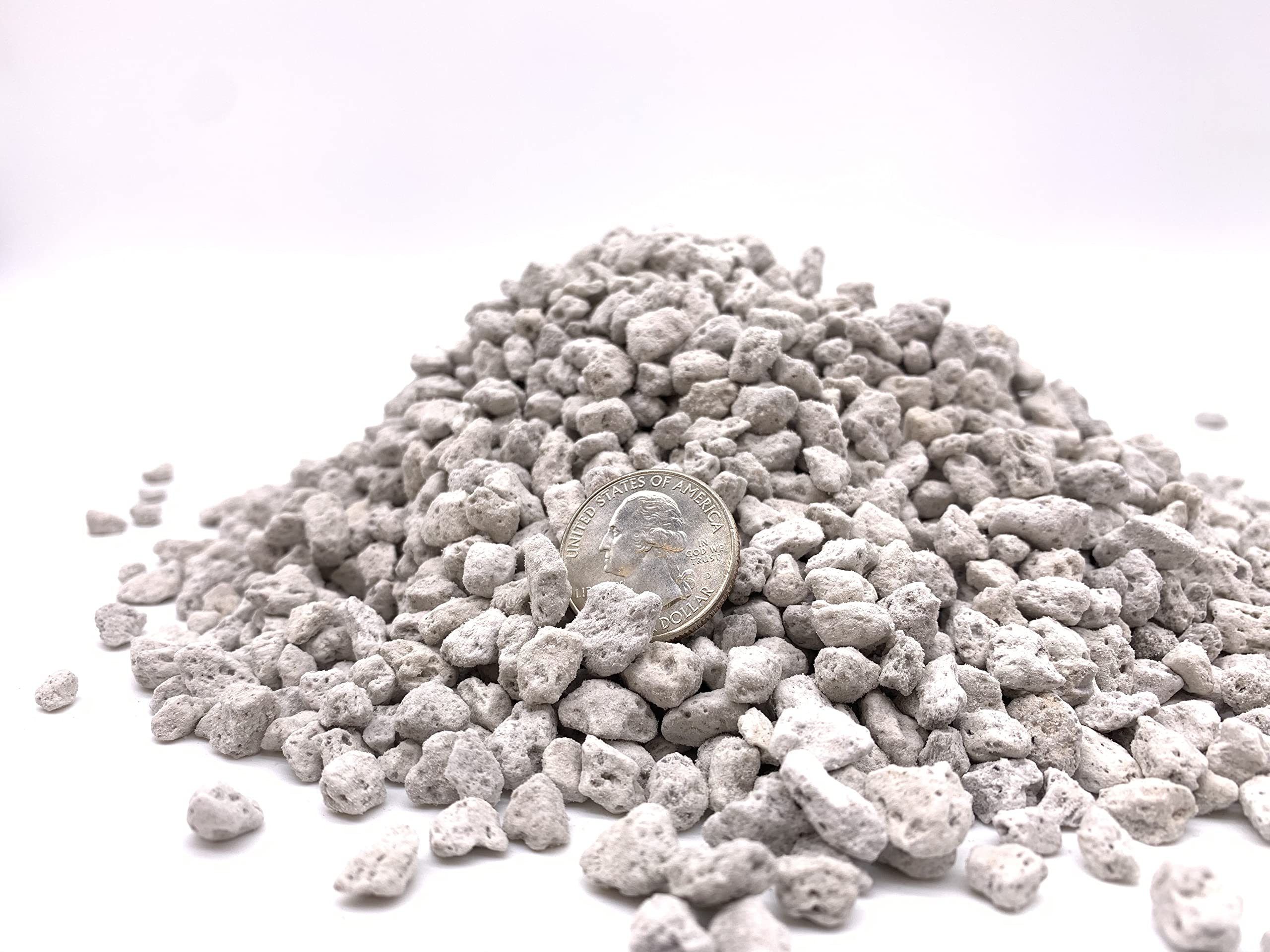 JK Global Imports pumice being poured into a soil mix for aeration