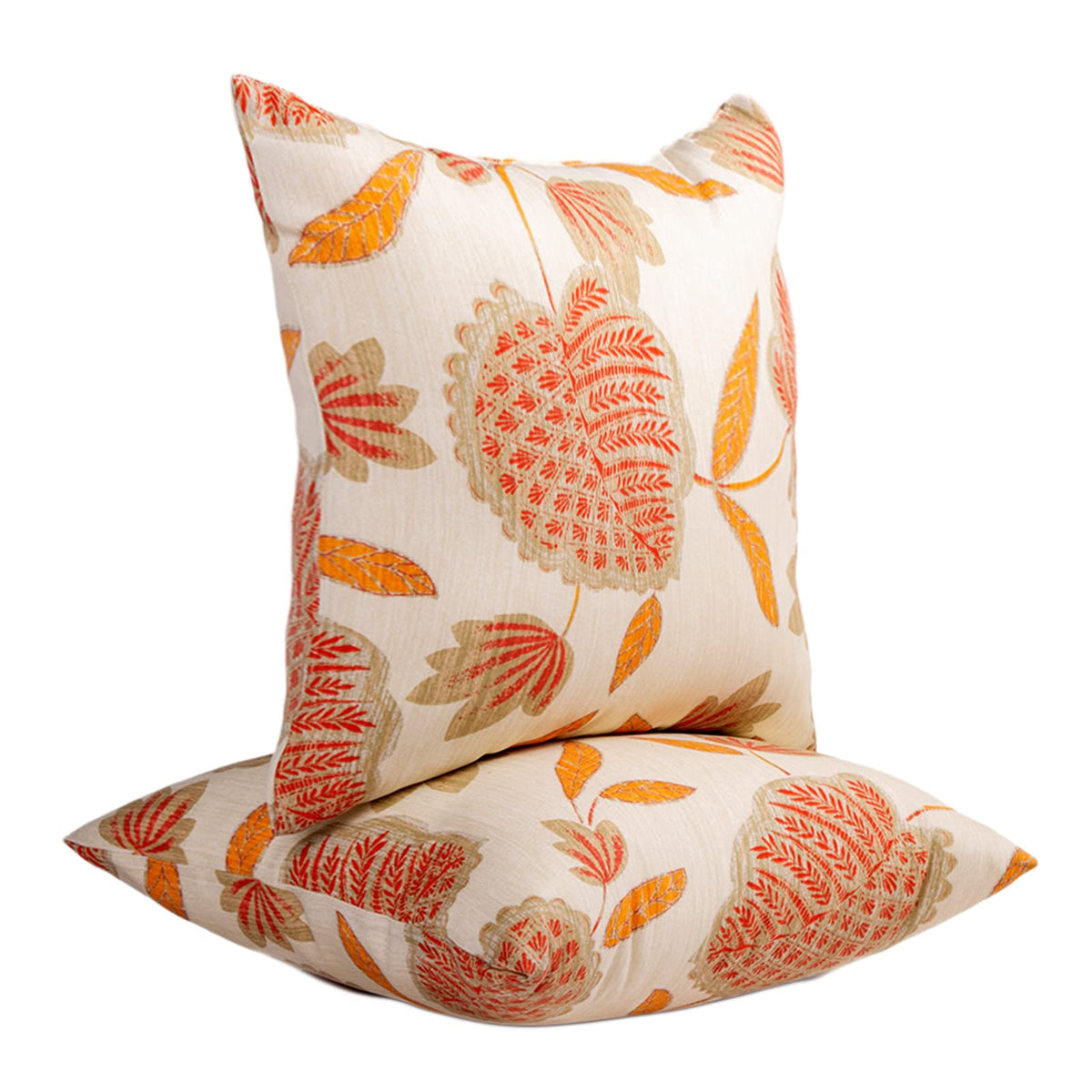 JMGBird outdoor pillow set on patio furniture, beige with orange leaf pattern.