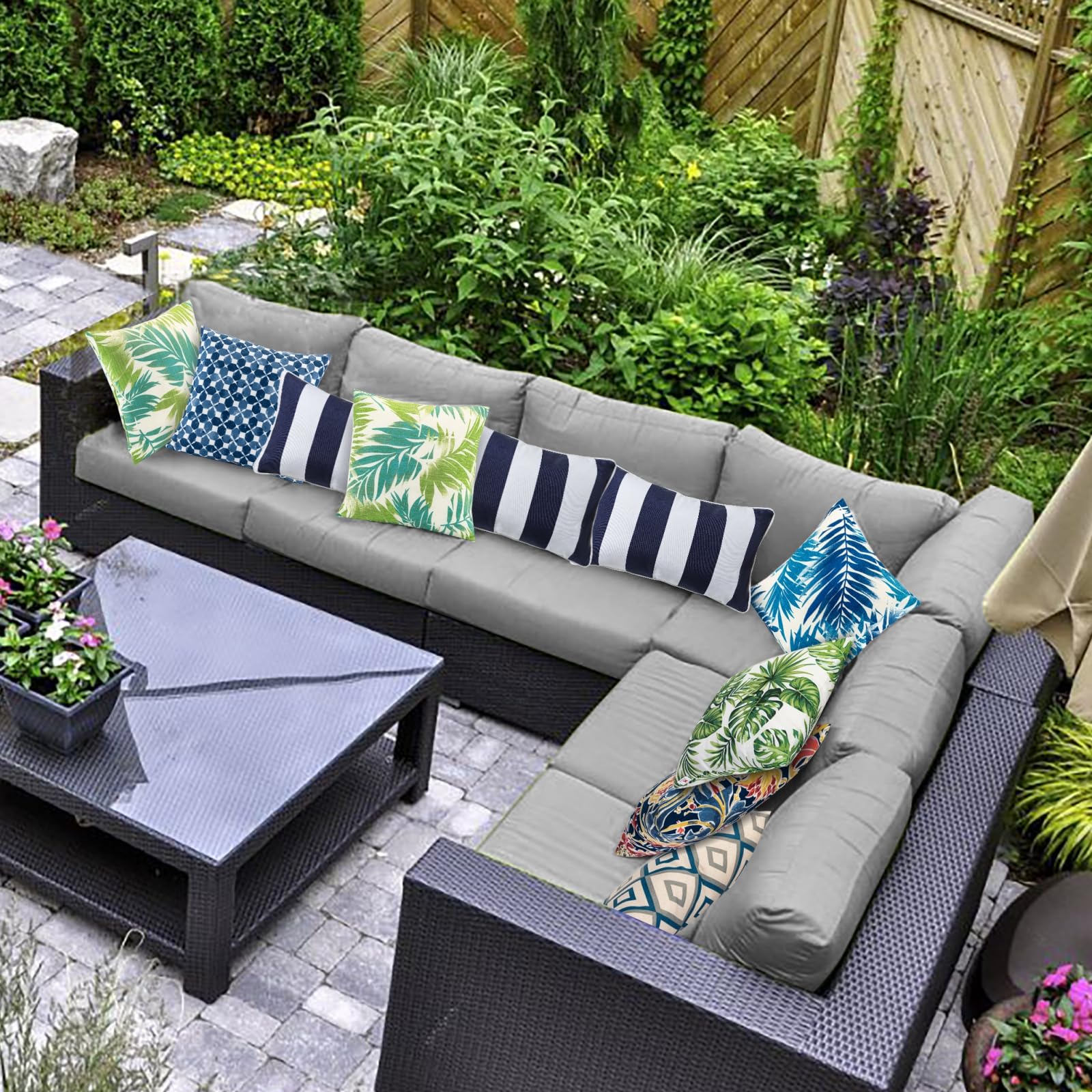 Water-repellent JMGBird patio pillows protect cushions during light rain.