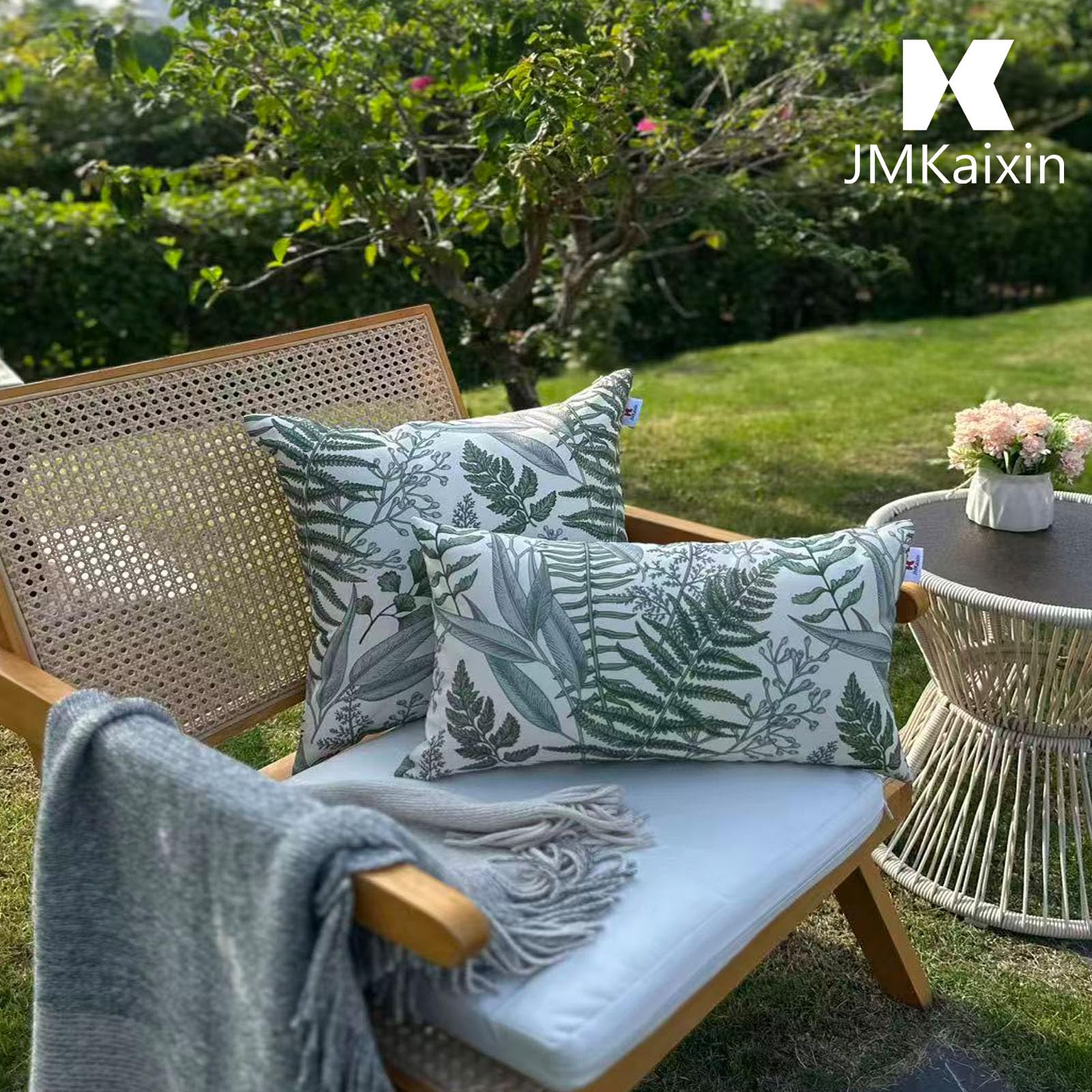 JMKaixin outdoor pillow setup on patio furniture for relaxing spaces.
